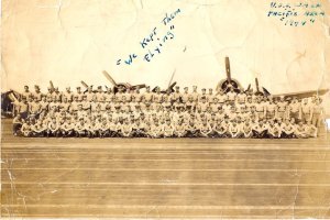 My dad is somewhere in the first row of this photo taken aboard the USS Wasp in 1944.  The handwritten notes are my dad's (Garcia family photo)